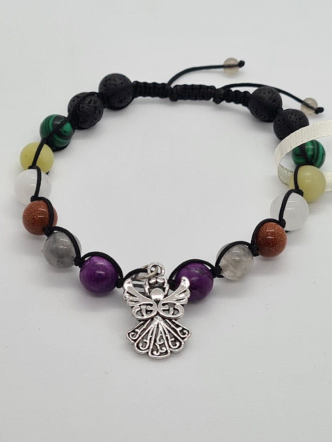 A beaded adjustable cord bracelet featuring a central silver-toned angel charm, black lava stone beads, and various colored gemstone beads including purple, green, brown, white, and gray, displayed on a light gray background.